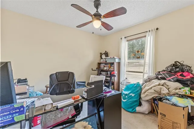 a room with furniture and a window