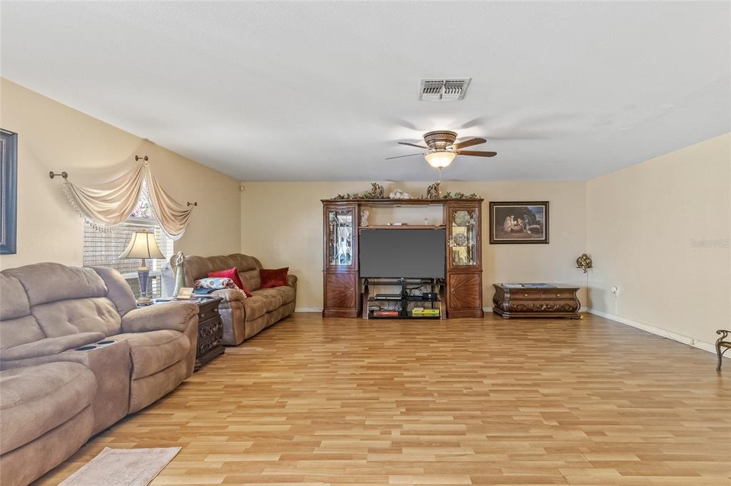 10311 Frog Pond Drive Riverview, FL 33569 - Photo 25 of 39 a living room with furniture