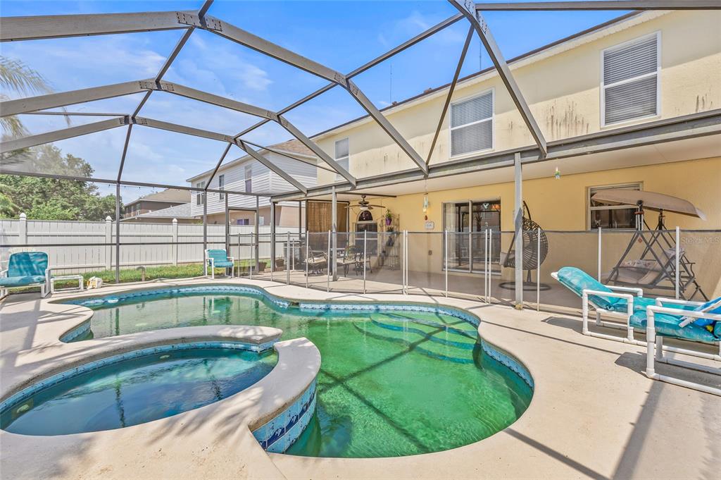 10311 Frog Pond Drive Riverview, FL 33569 - Photo 33 of 39 a view of a swimming pool with a patio