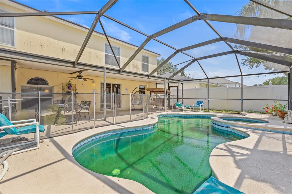10311 Frog Pond Drive Riverview, FL 33569 - Photo 34 of 39 a view of a swimming pool with a patio