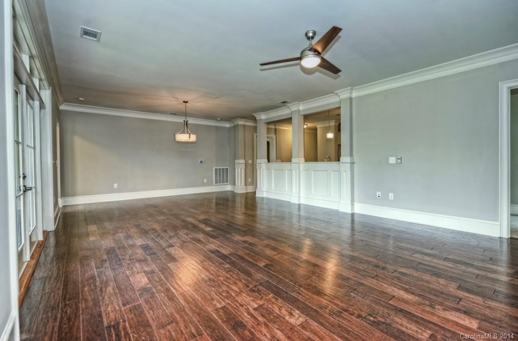 2128 Queens Road West, Unit 2128 Charlotte, NC 28209 - Photo 12 of 21 a view of empty room with wooden floor