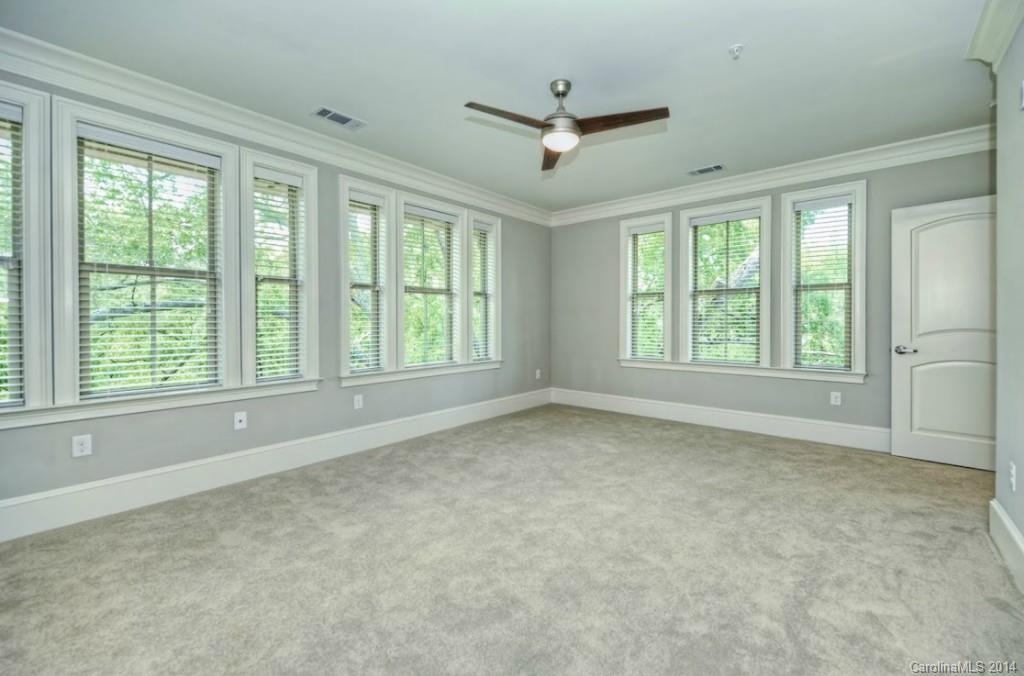 2128 Queens Road West, Unit 2128 Charlotte, NC 28209 - Photo 14 of 21 a view of an empty room with a window