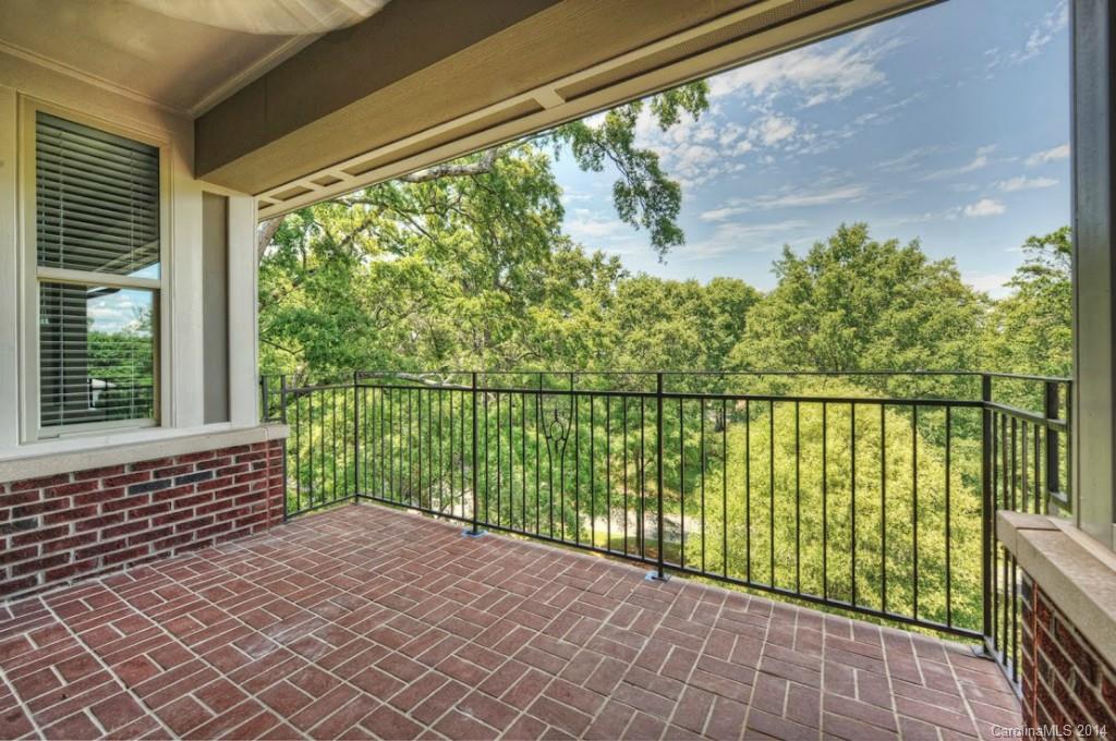 2128 Queens Road West, Unit 2128 Charlotte, NC 28209 - Photo 20 of 21 a balcony with a yard