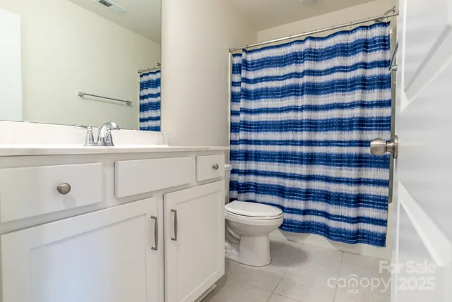 a view of a storage & utility room with closet