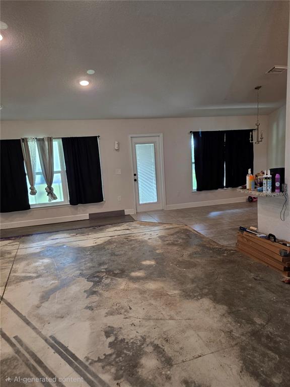 9 Cedar Run Ocala, FL 34472 - Photo 6 of 15 a view of a livingroom with furniture and kitchen