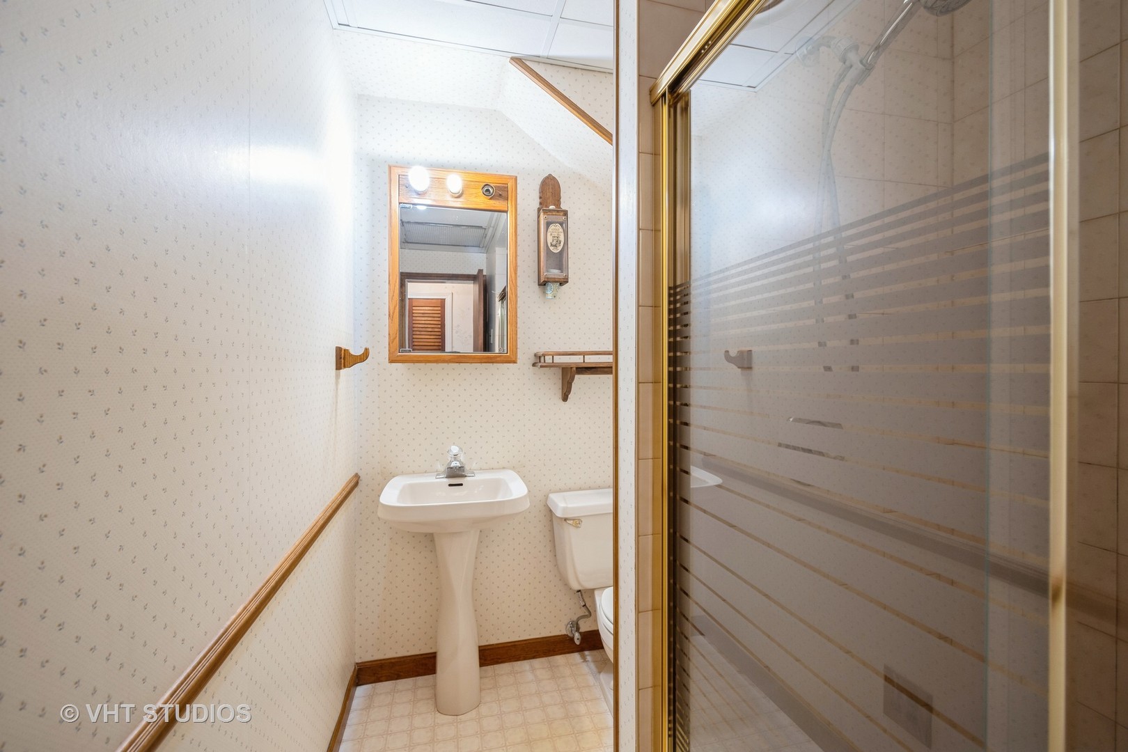 1657 Ridge Road Homewood, IL 60430 - Photo 15 of 19 a bathroom with a sink and a toilet