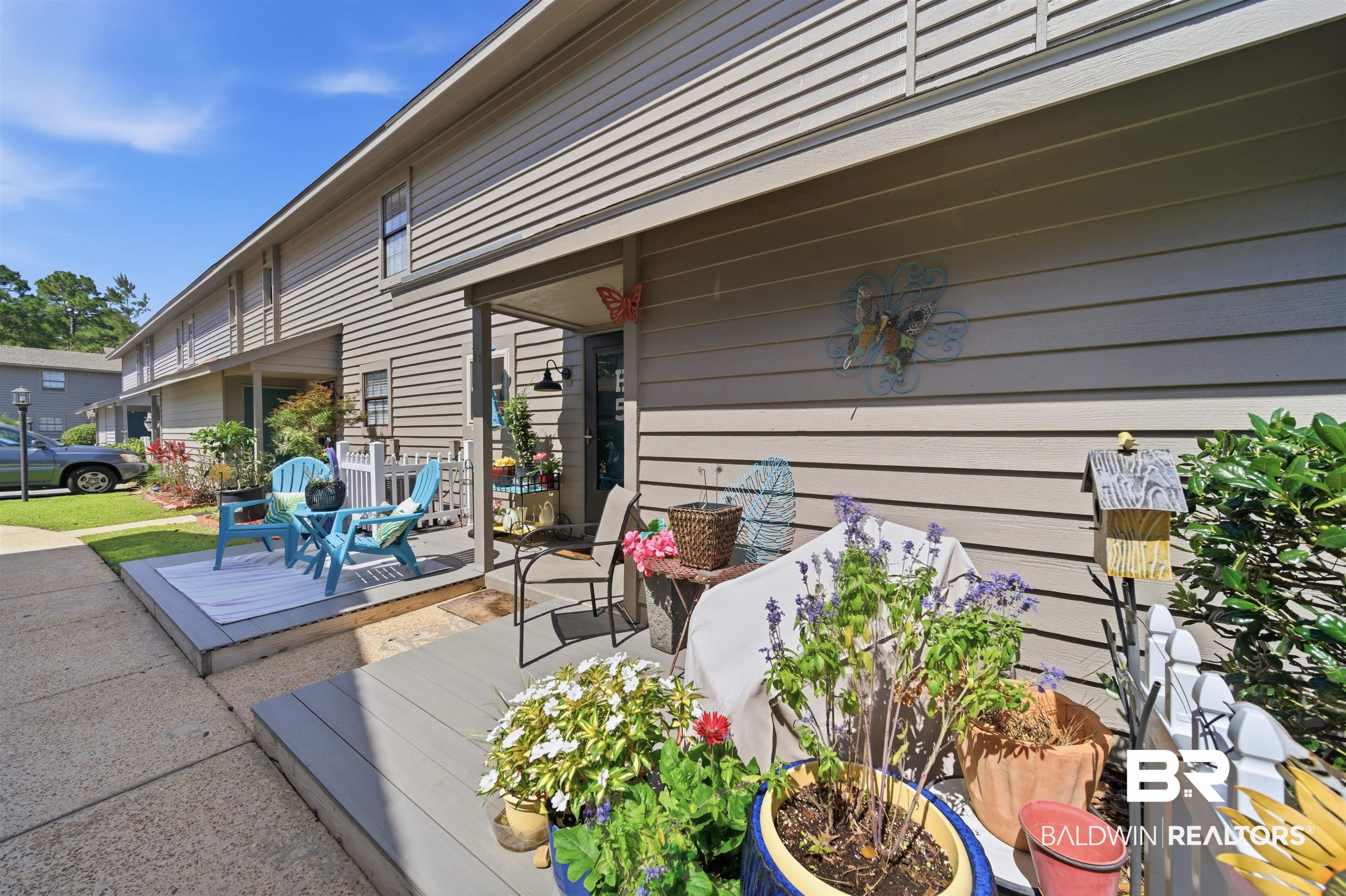389 Clubhouse Drive, Unit 5H Gulf Shores, AL 36542 - Photo 28 of 43 a great place to relax and enjoy gardening.