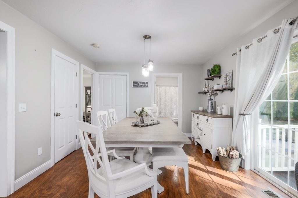 65 Haggerty Road Charlton, MA 01507 - Photo 15 of 34 a view of a dining room with furniture window and wooden floor