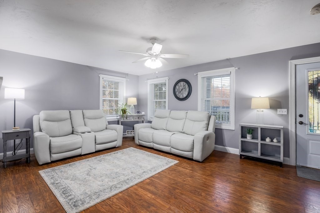 65 Haggerty Road Charlton, MA 01507 - Photo 17 of 34 a living room with furniture and a fireplace