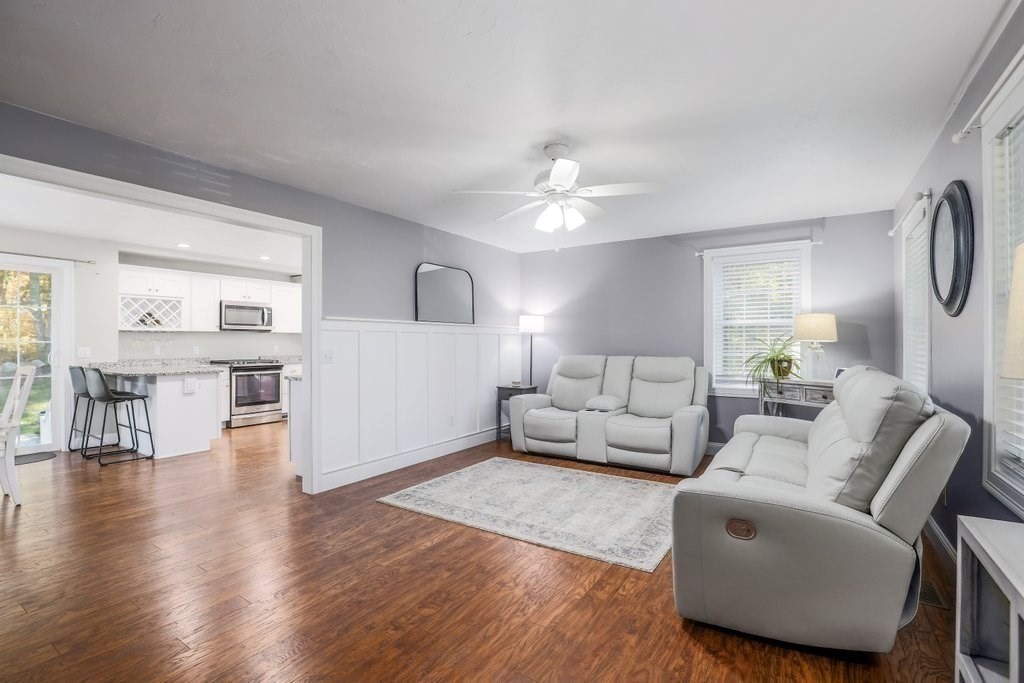 65 Haggerty Road Charlton, MA 01507 - Photo 18 of 34 a living room with furniture and a wooden floor