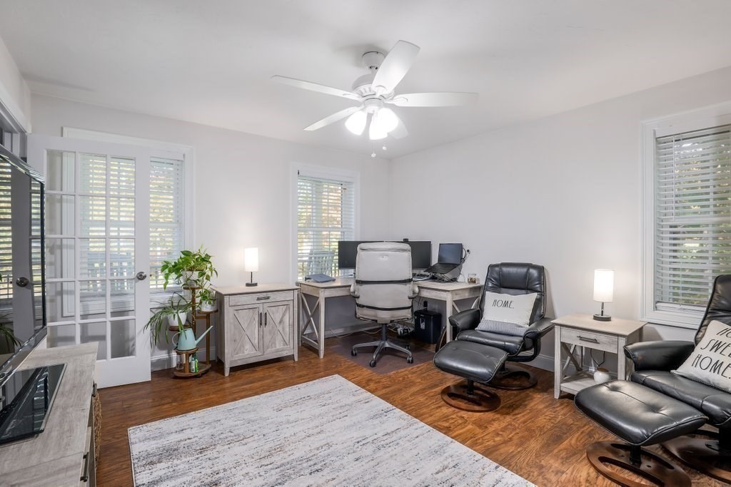 65 Haggerty Road Charlton, MA 01507 - Photo 19 of 34 a living room with furniture and a potted plant
