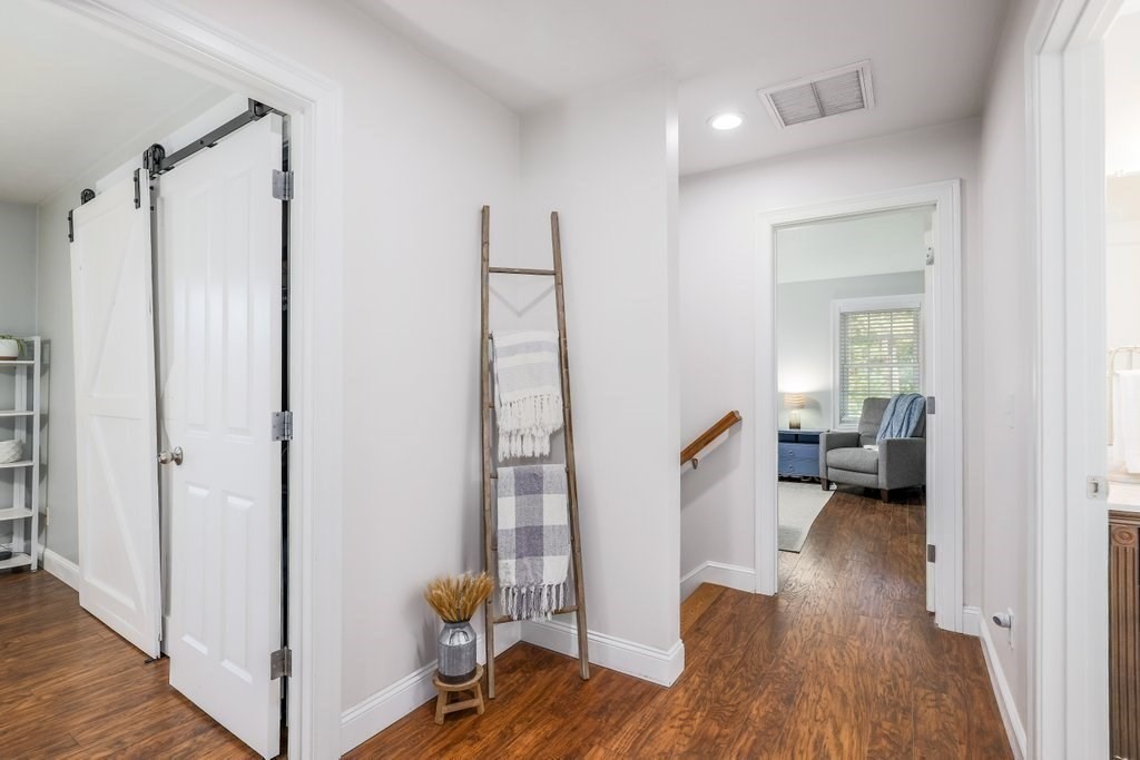 65 Haggerty Road Charlton, MA 01507 - Photo 29 of 34 a view of entryway with wooden floor and furniture