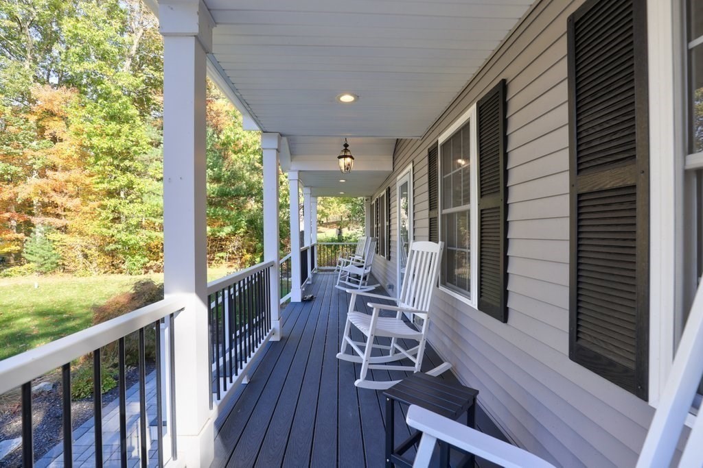 65 Haggerty Road Charlton, MA 01507 - Photo 5 of 34 a view of balcony with wooden floor and outdoor seating