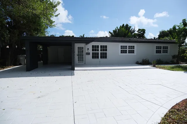 a house view with a outdoor space
