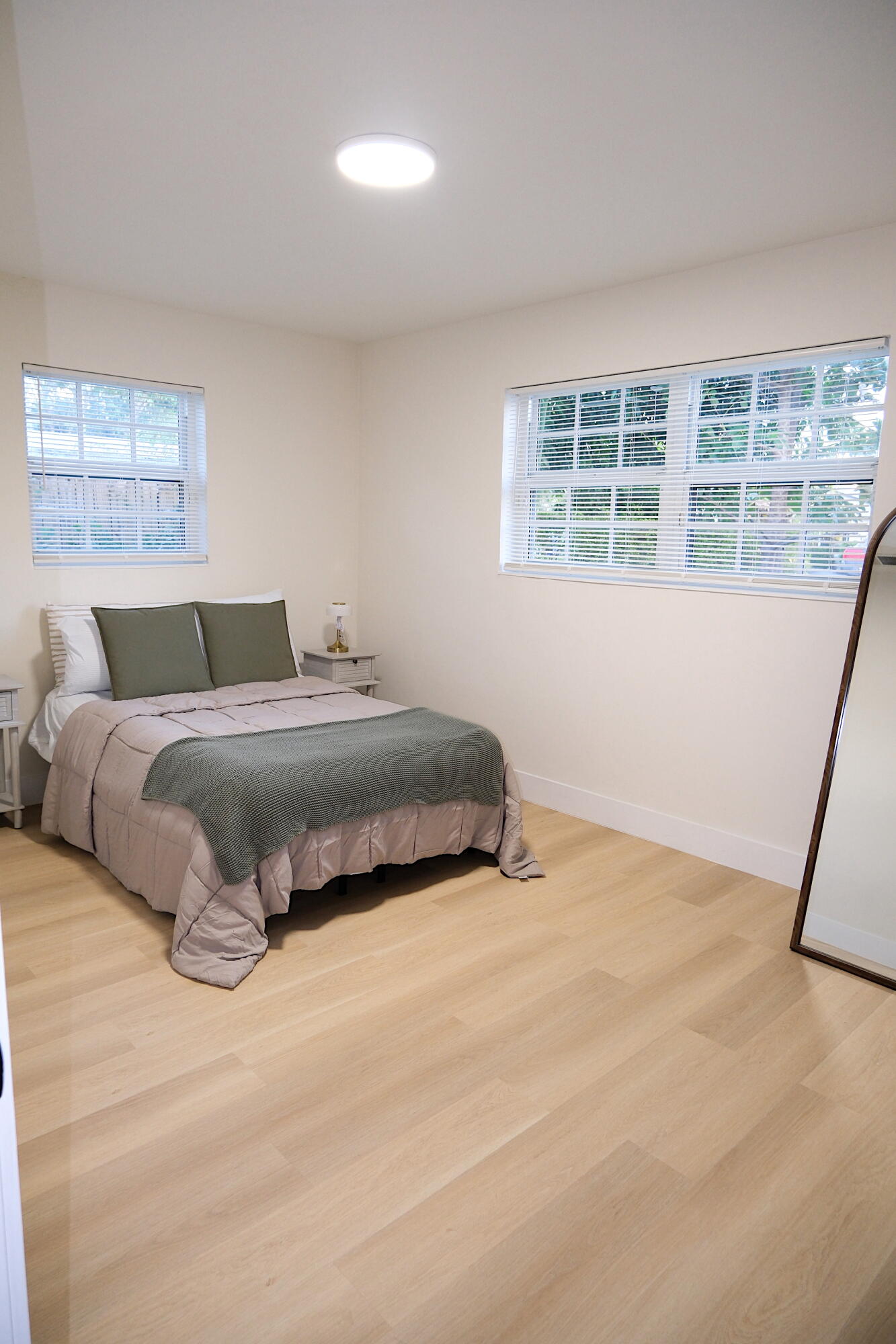 1084 Southwest 4th Avenue Pompano Beach, FL 33060 - Photo 25 of 35 a bedroom with a bed and a window