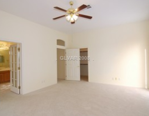 4664 Monument Valley Road Las Vegas, NV 89129 - Photo 6 of 9 Master Bedroom.