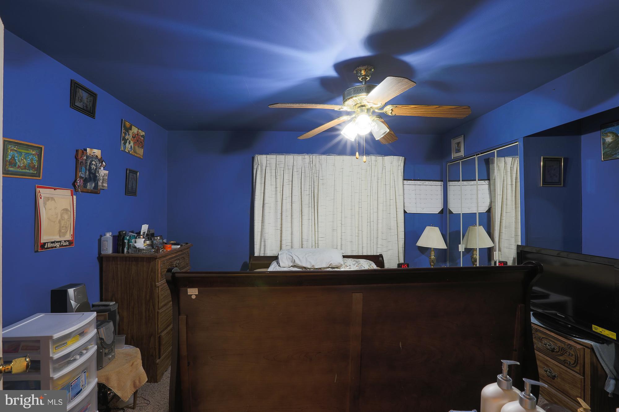 4119 Crest Heights Road Baltimore, MD 21215 - Photo 23 of 32 a room with furniture and chandelier