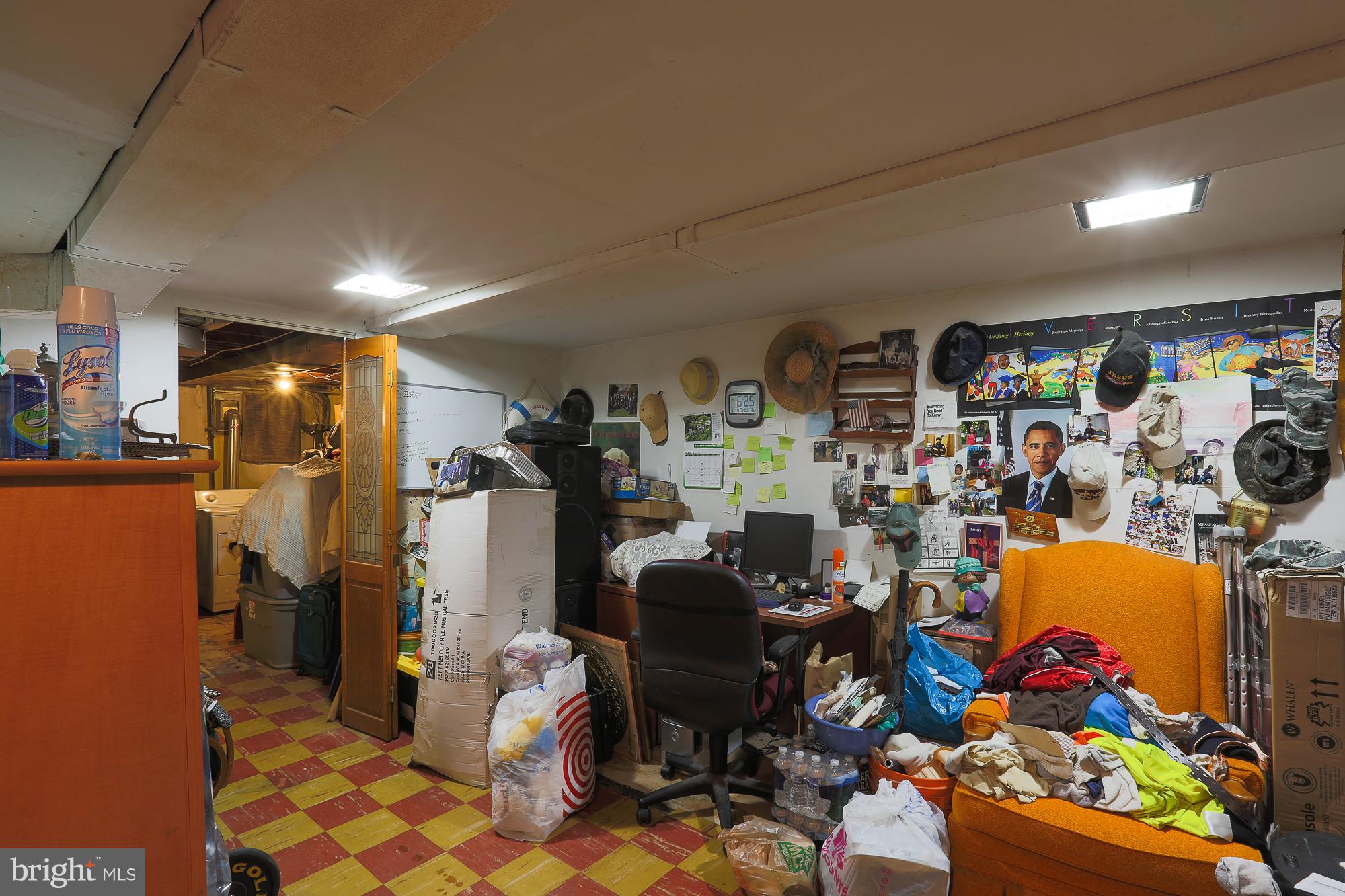 4119 Crest Heights Road Baltimore, MD 21215 - Photo 24 of 32 a room with gym equipment and toys