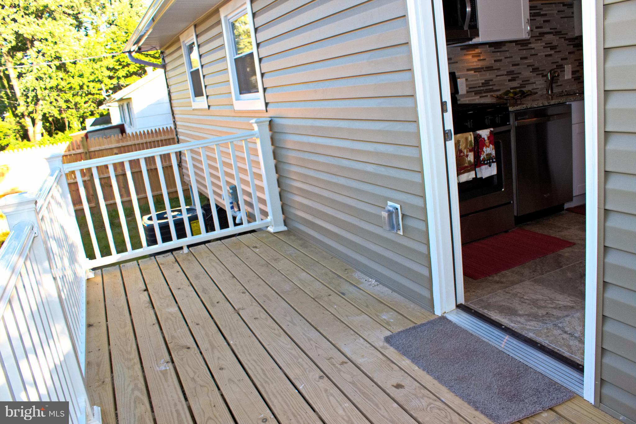 315 Highfalcon Road Reisterstown, MD 21136 - Photo 10 of 30 a view of wooden balcony