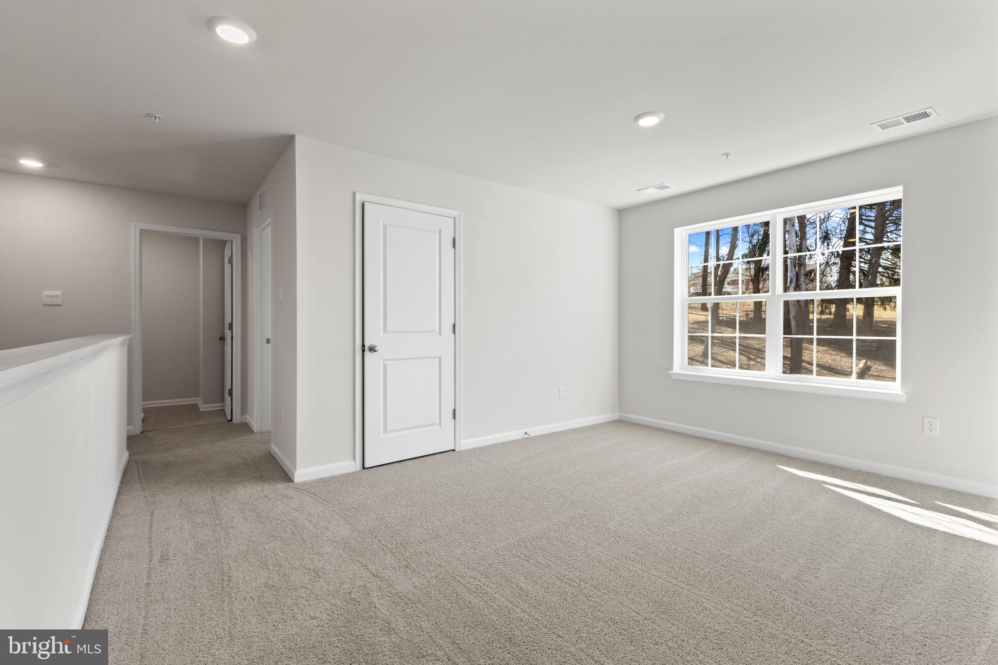 562 Atkinson Street Charles Town, WV 25414 - Photo 22 of 33 an empty room with windows