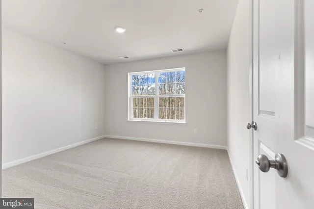 a view of livingroom with hardwood floor and window