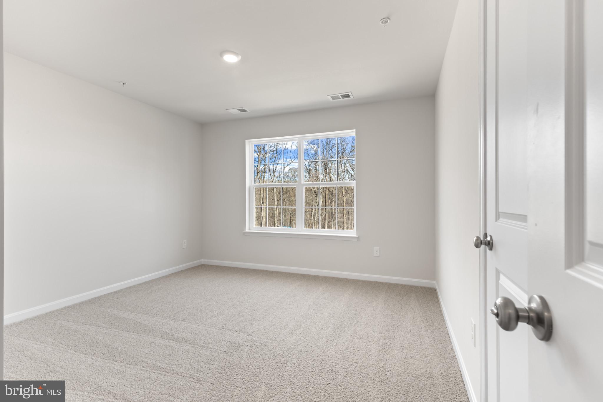 562 Atkinson Street Charles Town, WV 25414 - Photo 24 of 33 a view of livingroom with hardwood floor and window