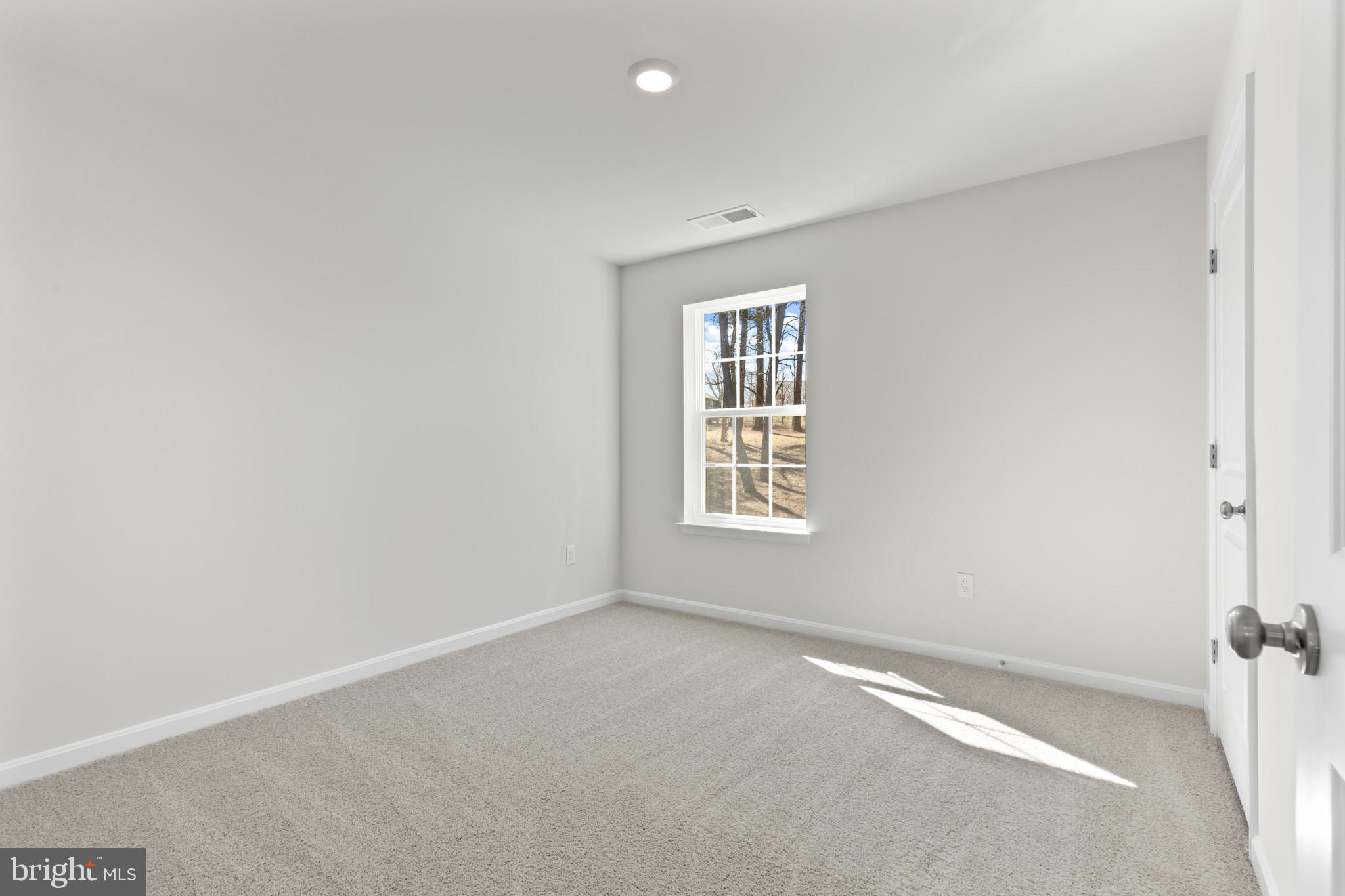 562 Atkinson Street Charles Town, WV 25414 - Photo 28 of 33 an empty room with windows
