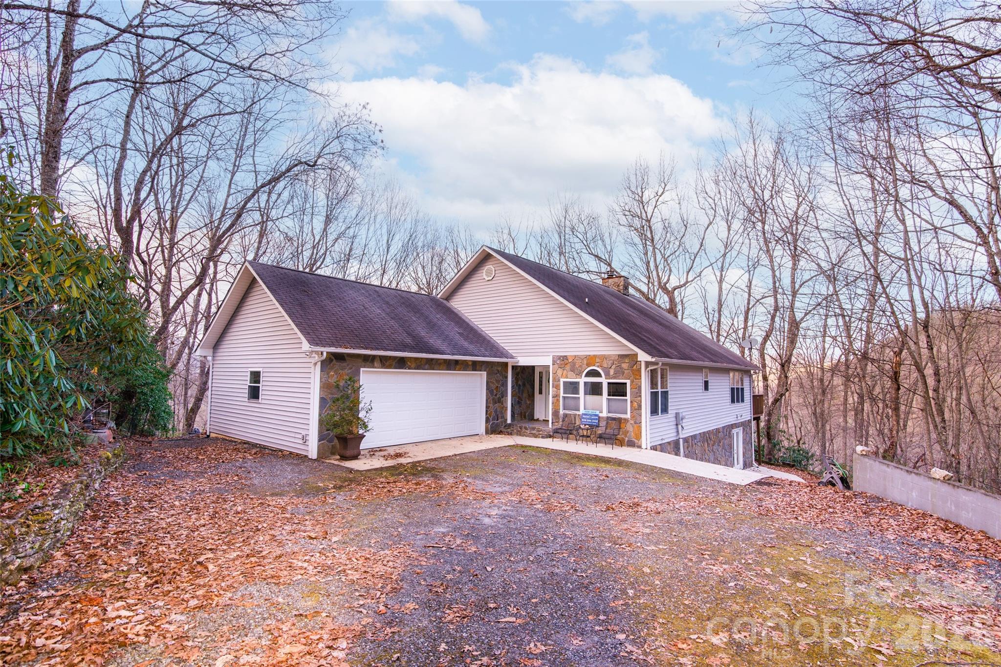 a house with trees in front of it