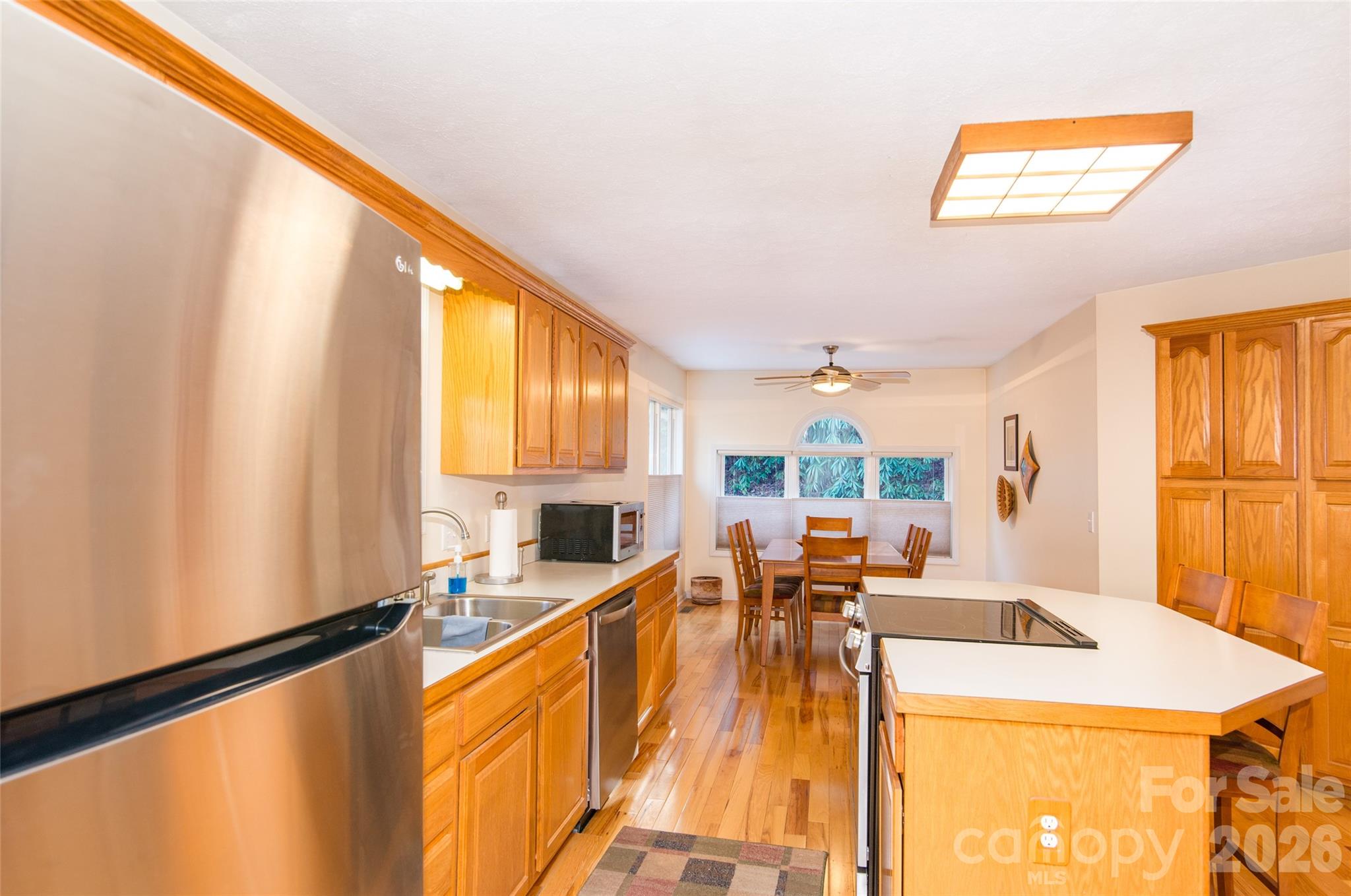 194 Ridgeview Drive Whittier, NC 28789 - Photo 15 of 43 a very nice looking room with a large window and a dining table