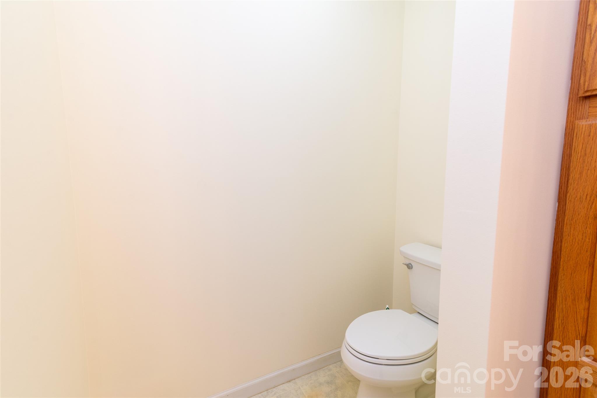 194 Ridgeview Drive Whittier, NC 28789 - Photo 26 of 43 a white toilet sitting next to a white wall