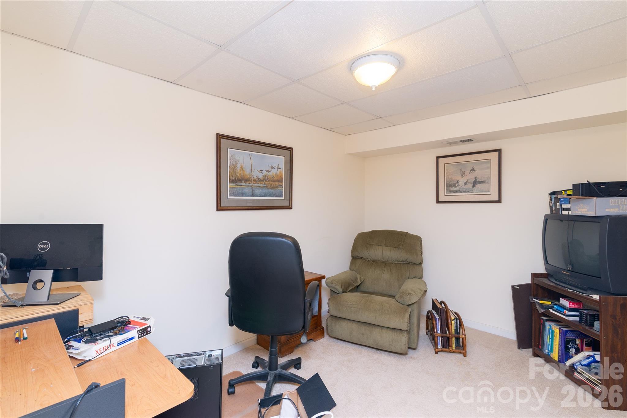 194 Ridgeview Drive Whittier, NC 28789 - Photo 29 of 43 a living room with furniture and a flat screen tv