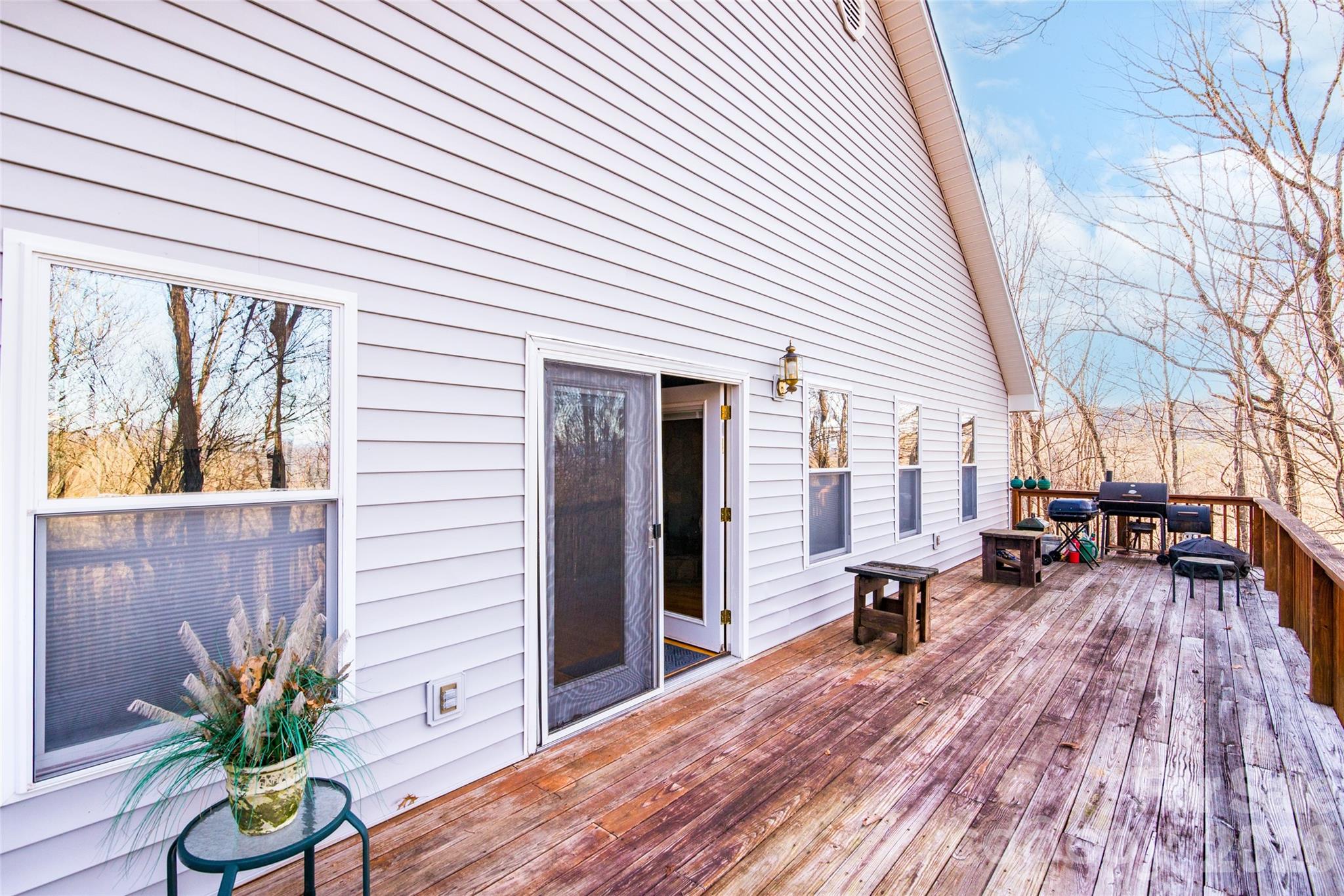194 Ridgeview Drive Whittier, NC 28789 - Photo 31 of 43 a outdoor space with patio the couches and a potted plant