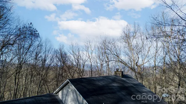 a view of tree in front of a house
