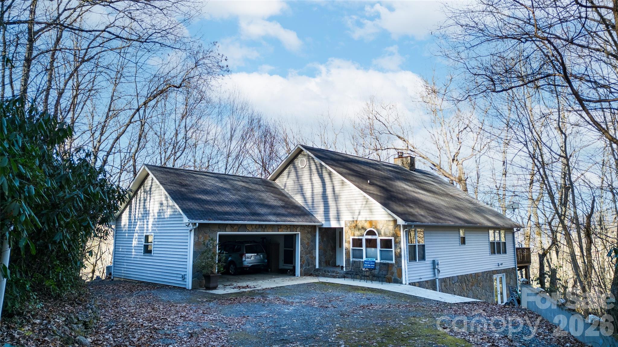 194 Ridgeview Drive Whittier, NC 28789 - Photo 5 of 43 a view of a house with a yard and tree s