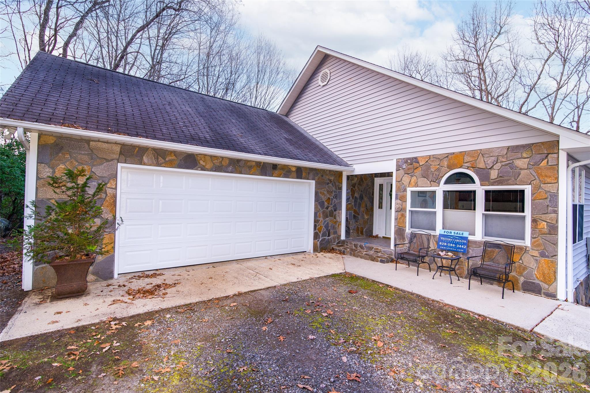 194 Ridgeview Drive Whittier, NC 28789 - Photo 6 of 43 a view of a house with backyard and sitting area