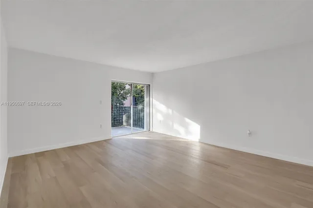 a bathroom with a granite countertop toilet sink and shower