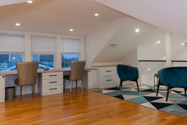 a room with furniture and a chair