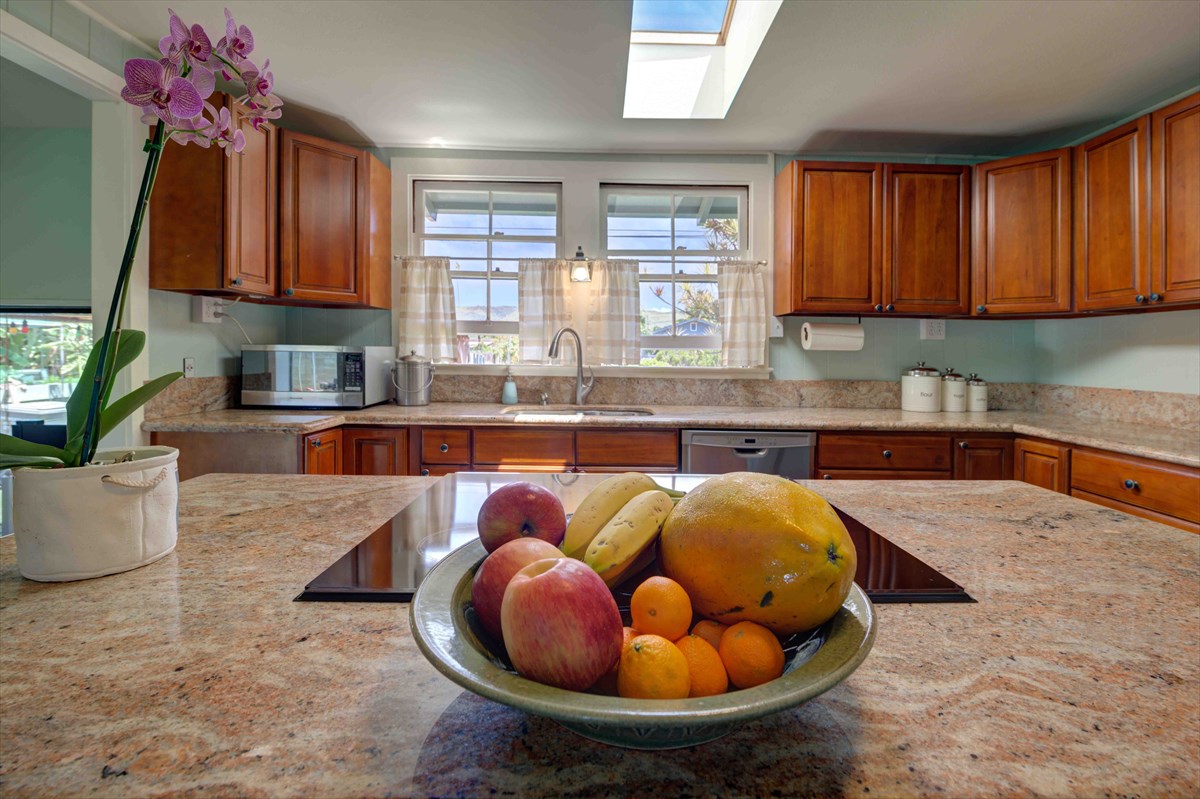 7990 Elepaio Road Kekaha, HI 96752 - Photo 6 of 25 a kitchen with a sink cabinets and window