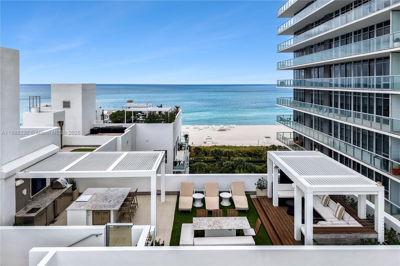 3739 Collins Avenue, Unit N605 Miami Beach, FL 33140 - Photo 2 of 20 a view of a city from a terrace