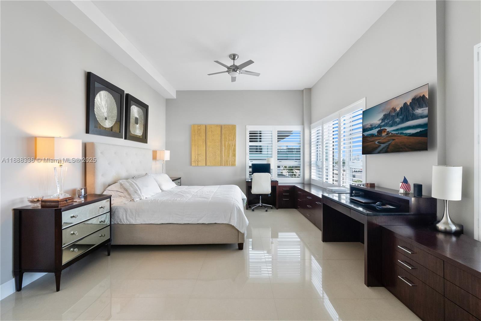 3739 Collins Avenue, Unit N605 Miami Beach, FL 33140 - Photo 8 of 20 a bedroom with a bed couch and window