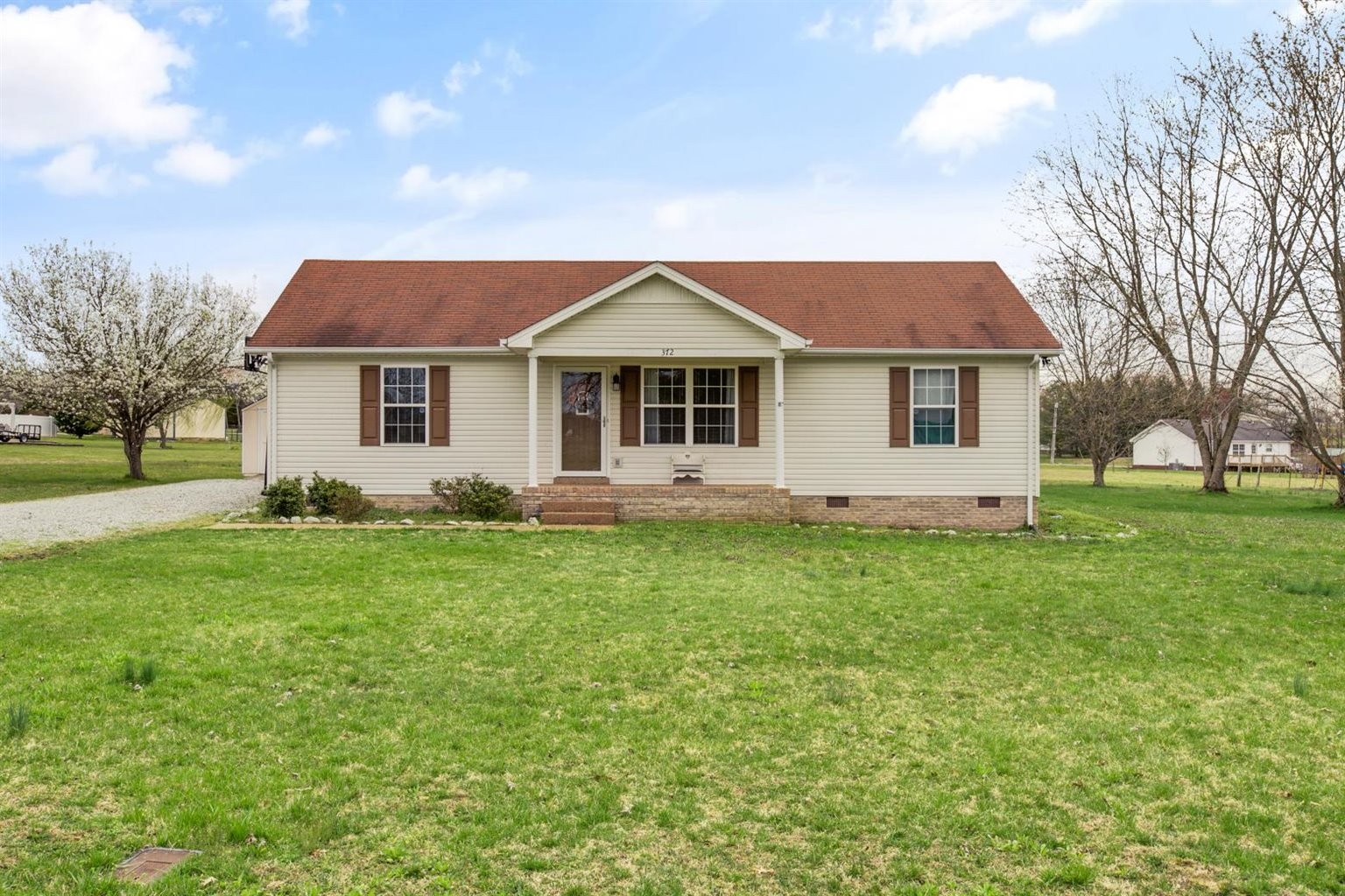 372 Freeland Road Portland, TN 37148 - Photo 1 of 41 a front view of house with yard and green space