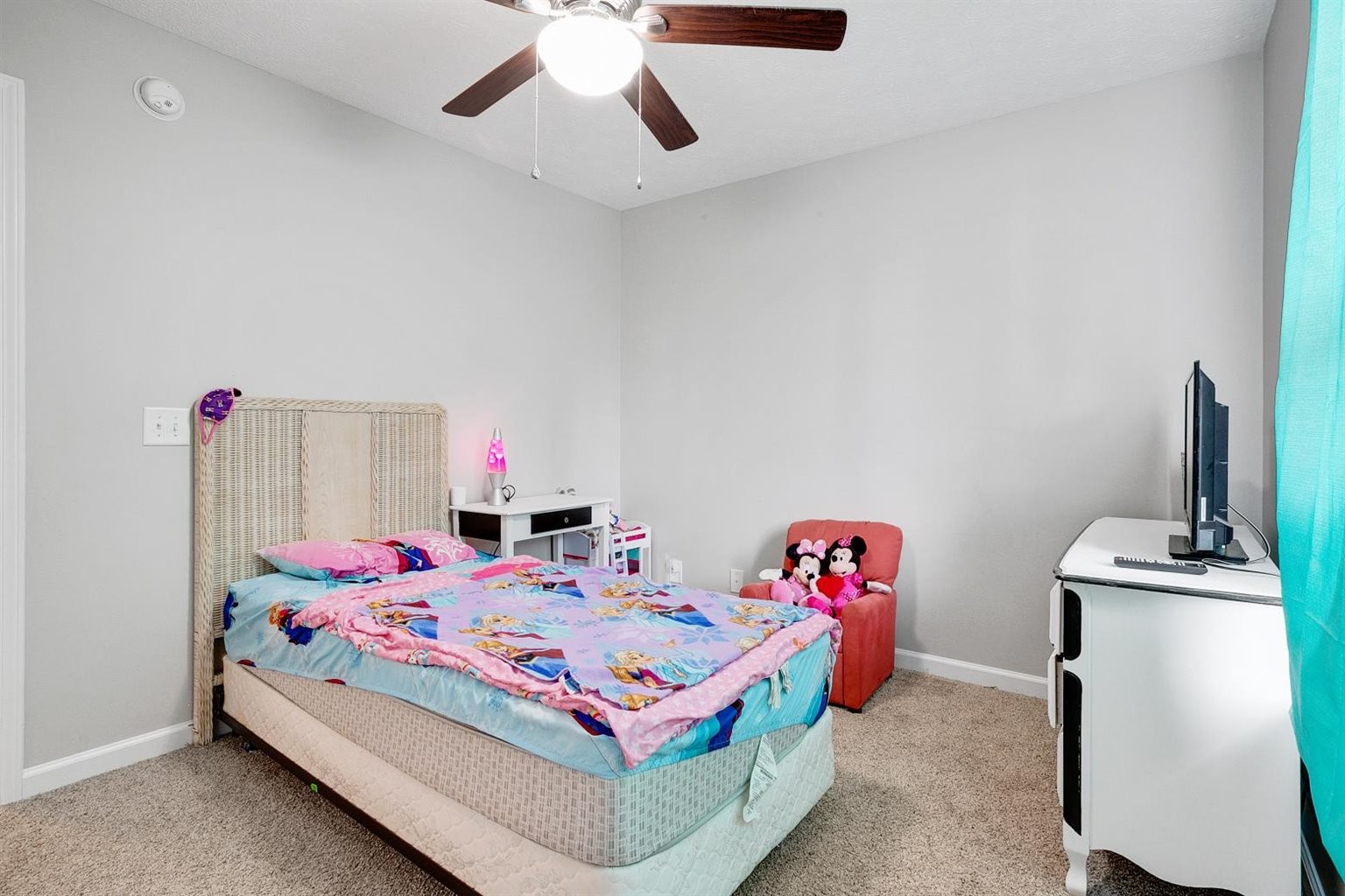 372 Freeland Road Portland, TN 37148 - Photo 27 of 41 a bedroom with a bed and a chandelier