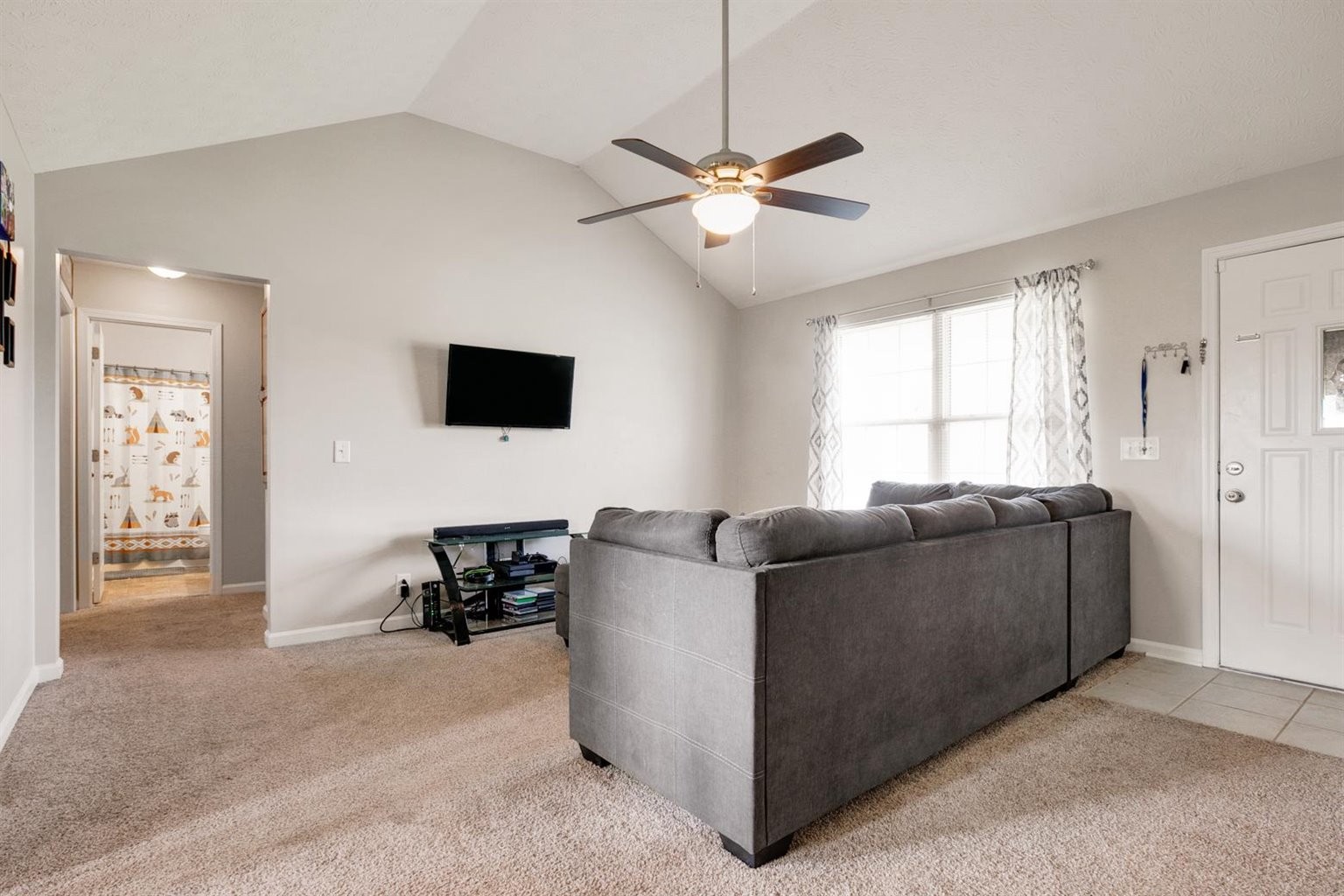 372 Freeland Road Portland, TN 37148 - Photo 5 of 41 a living room with furniture and a flat screen tv