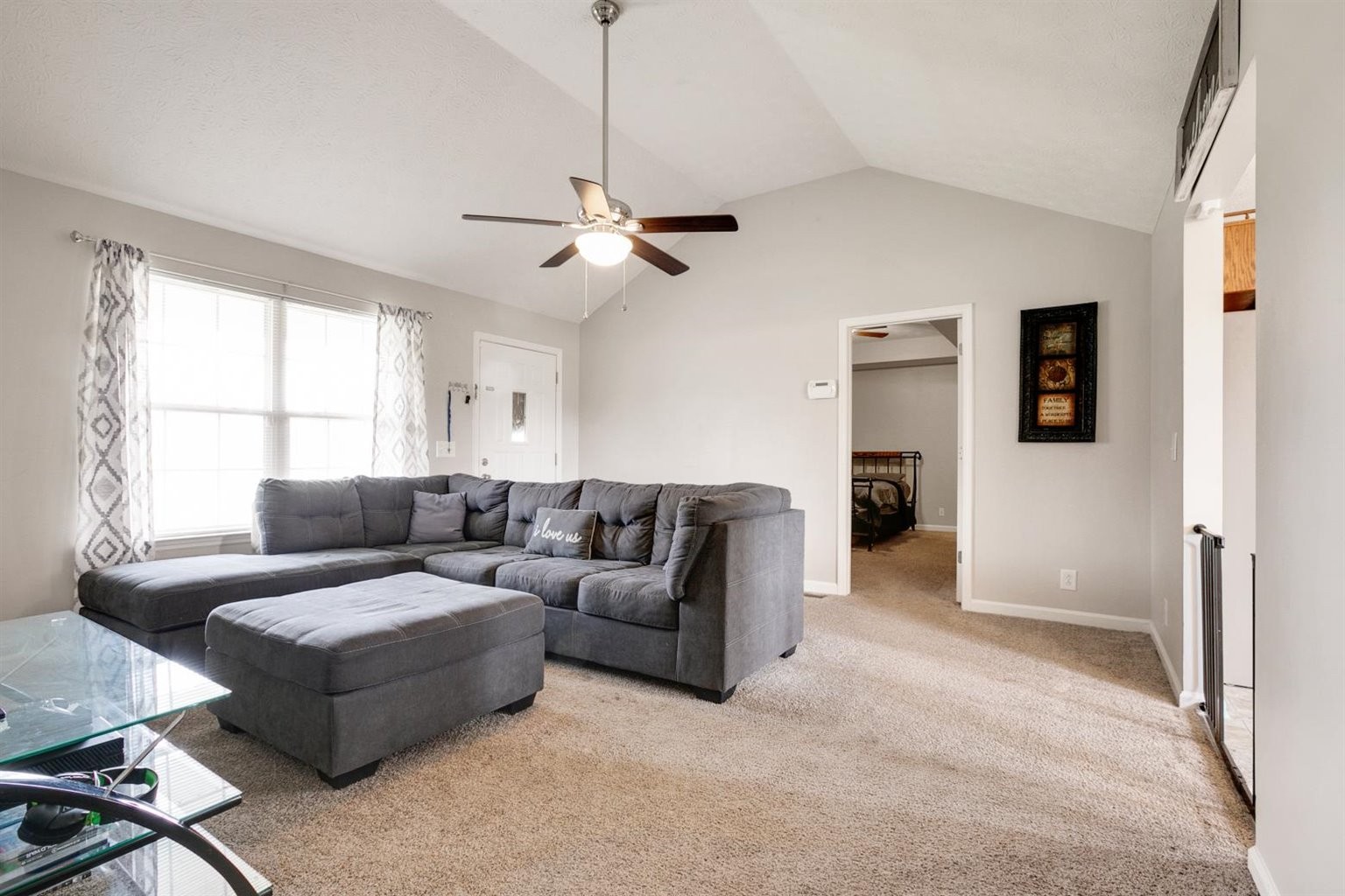 372 Freeland Road Portland, TN 37148 - Photo 6 of 41 a living room with furniture a ceiling fan and a window