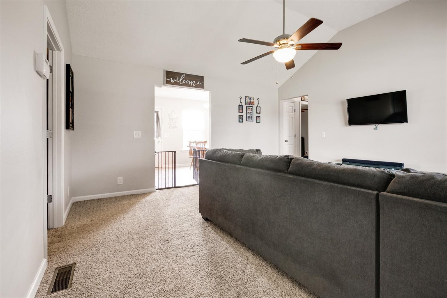 372 Freeland Road Portland, TN 37148 - Photo 8 of 41 a living room with furniture and a flat screen tv