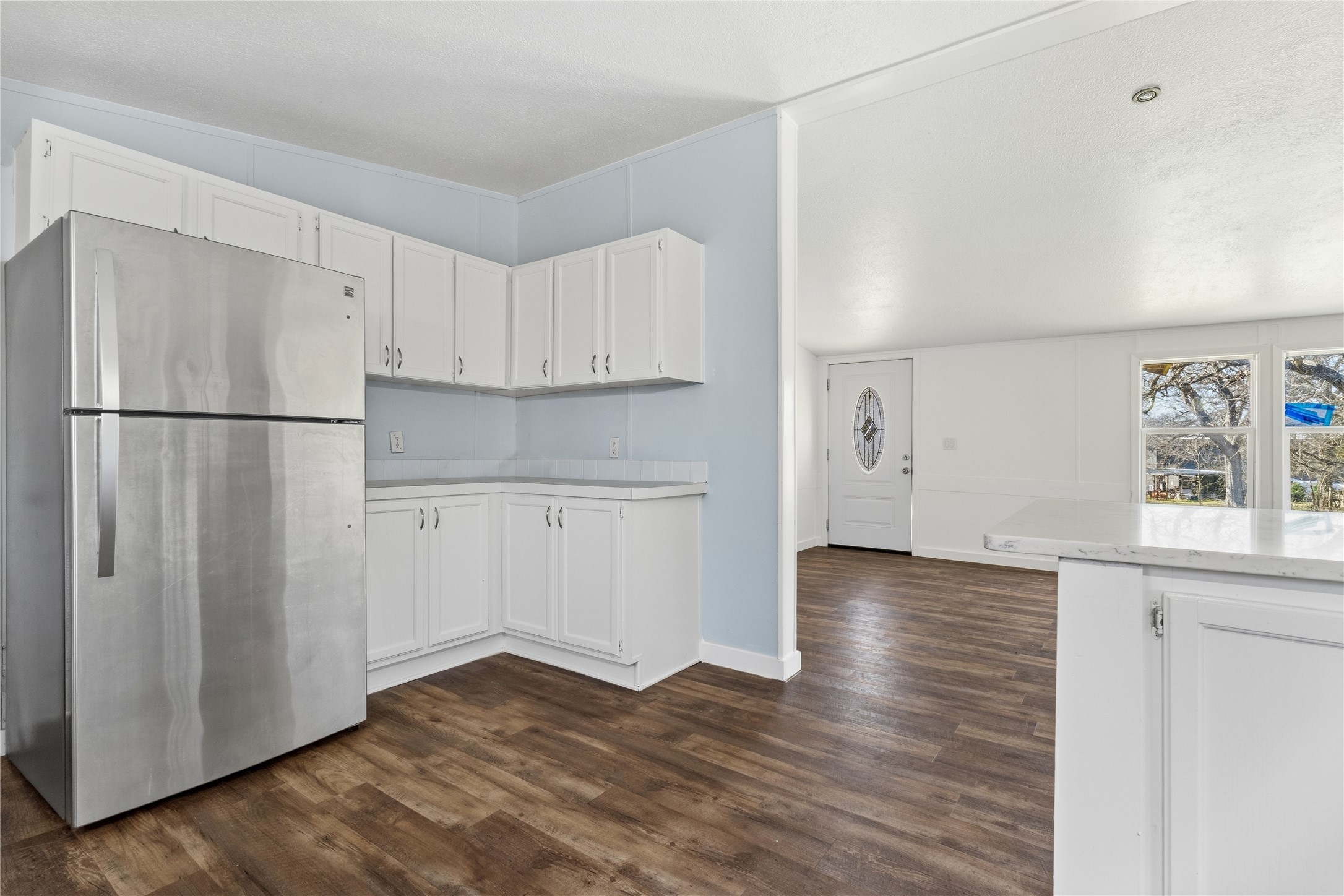 1029 Old McDade Road, Unit C Elgin, TX 78621 - Photo 18 of 33 a view of kitchen with wooden floor