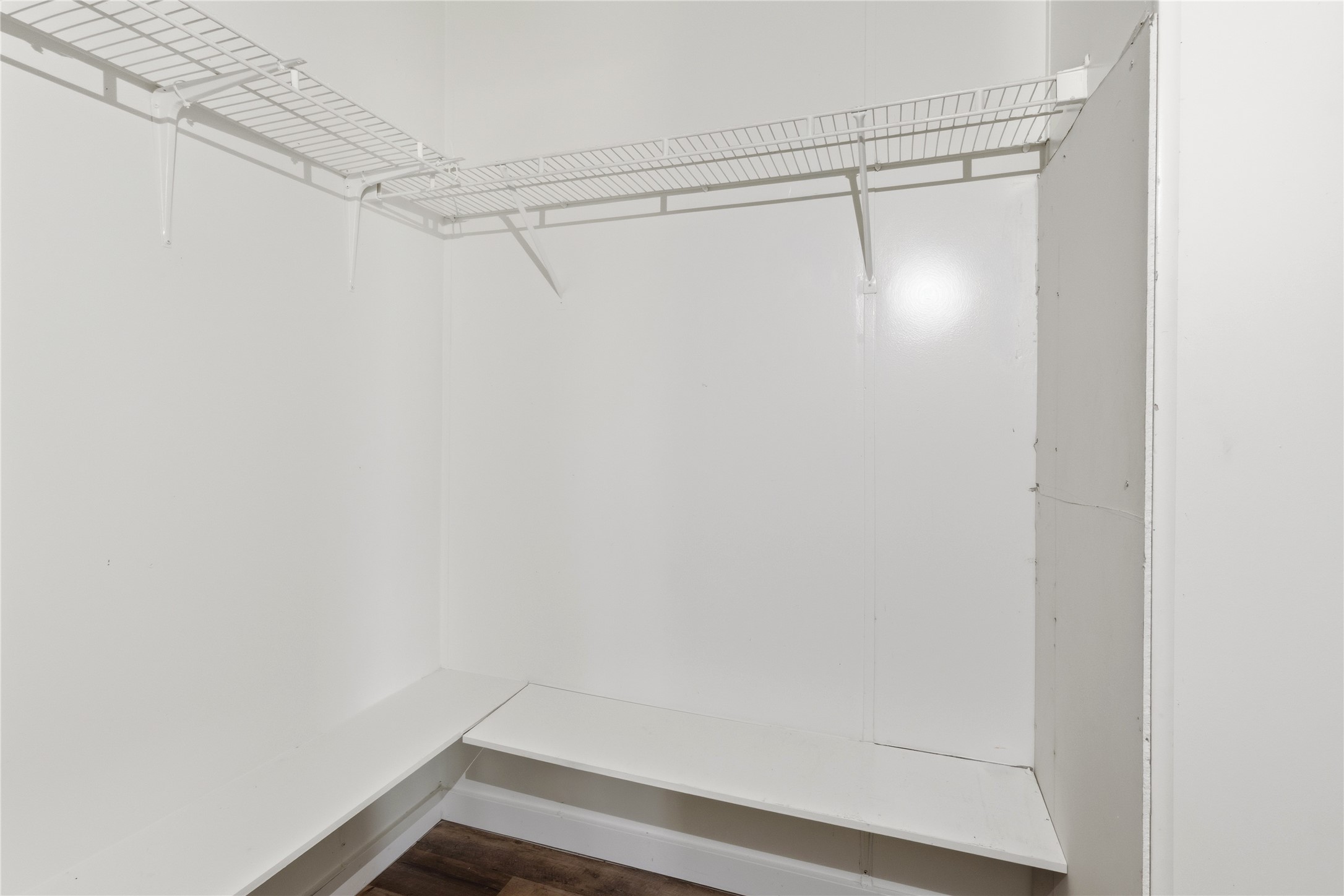 1029 Old McDade Road, Unit C Elgin, TX 78621 - Photo 24 of 33 a view of a room with racks on the wall