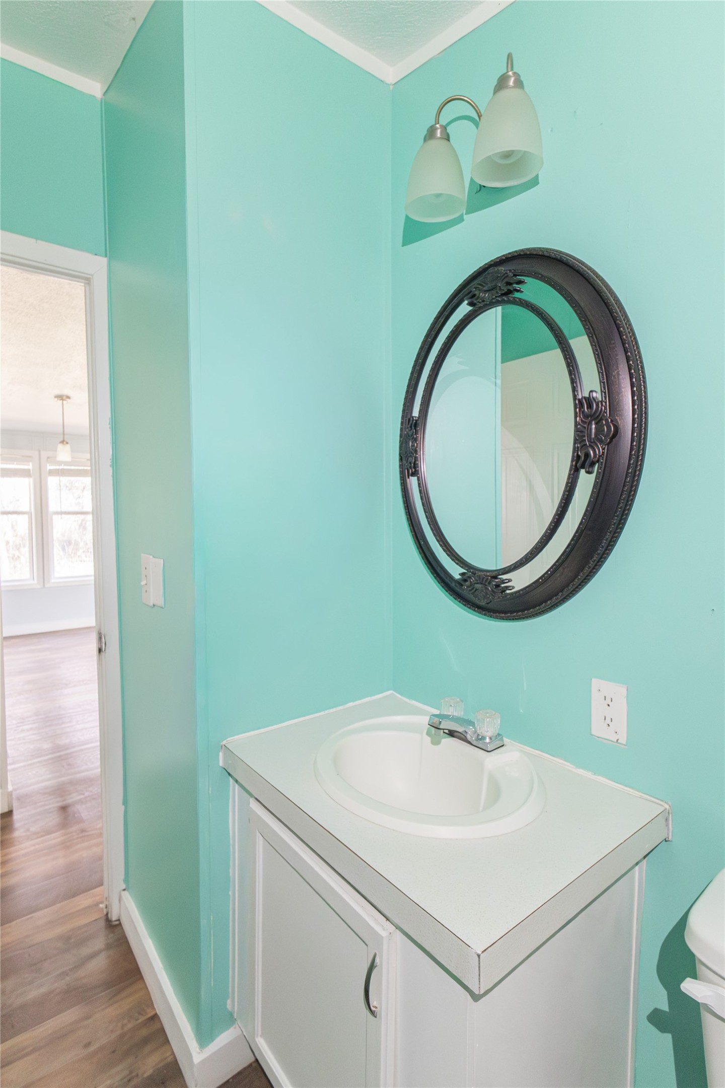 1029 Old McDade Road, Unit C Elgin, TX 78621 - Photo 31 of 33 a bathroom with a sink and a mirror