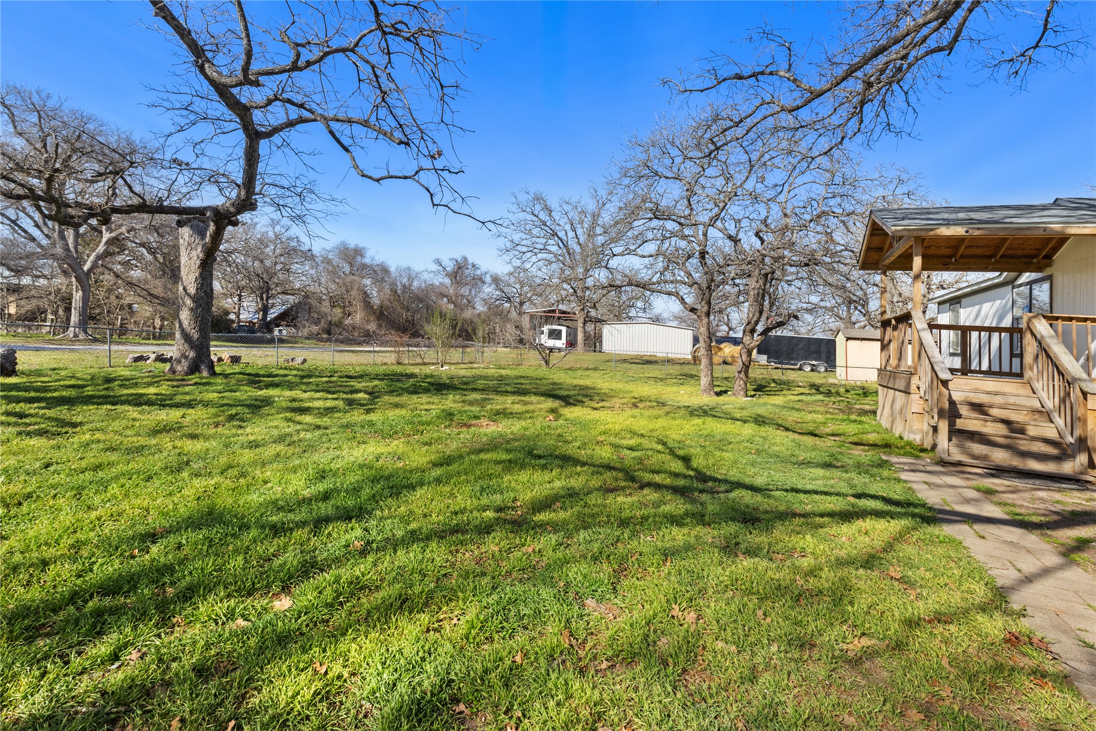 1029 Old McDade Road, Unit C Elgin, TX 78621 - Photo 5 of 33 a view of a yard with a house