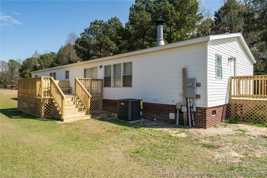 515 Mt Zion Road Red Springs, NC 28377 - Photo 42 of 50 a view of a house with a yard